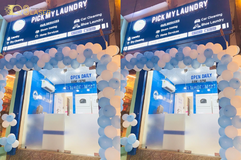 Biển hiệu giặt là treo trước tiệm